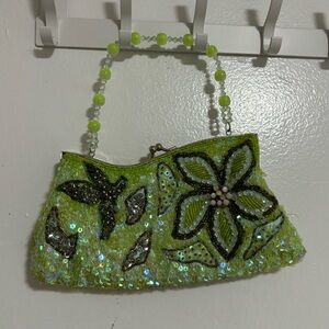 green sequined purse